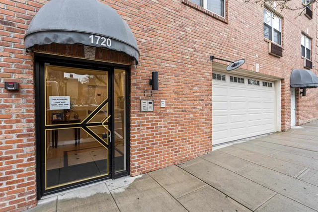 a front view of a building with glass windows