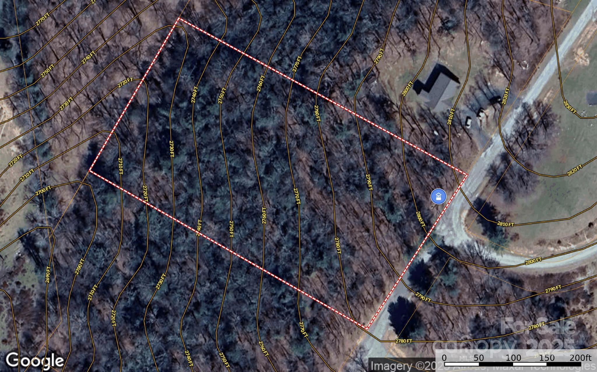 34 Fox Crest, Unit NONE Laurel Springs, NC 28644 - Photo 13 of 22 a black and white building with trees in the background