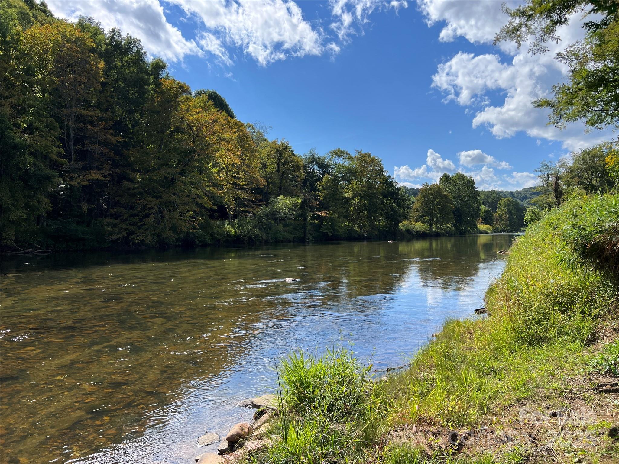 34 Fox Crest, Unit NONE Laurel Springs, NC 28644 - Photo 19 of 22 a view of a lake with a lake in the background