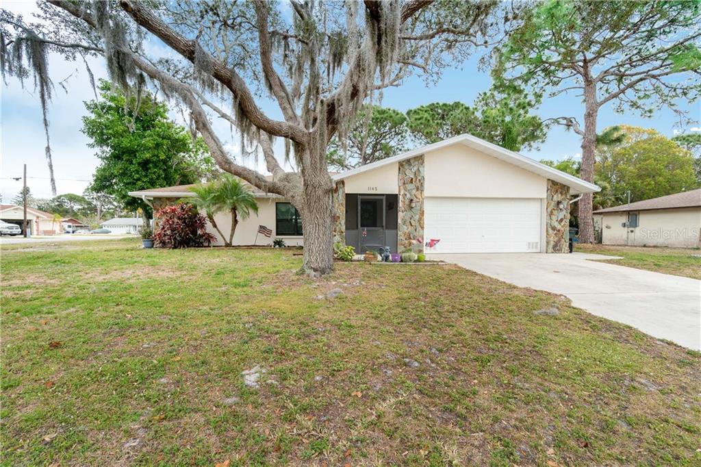 1145 Graham Road Venice, FL 34293 - Photo 1 of 1 a view of a house with a yard