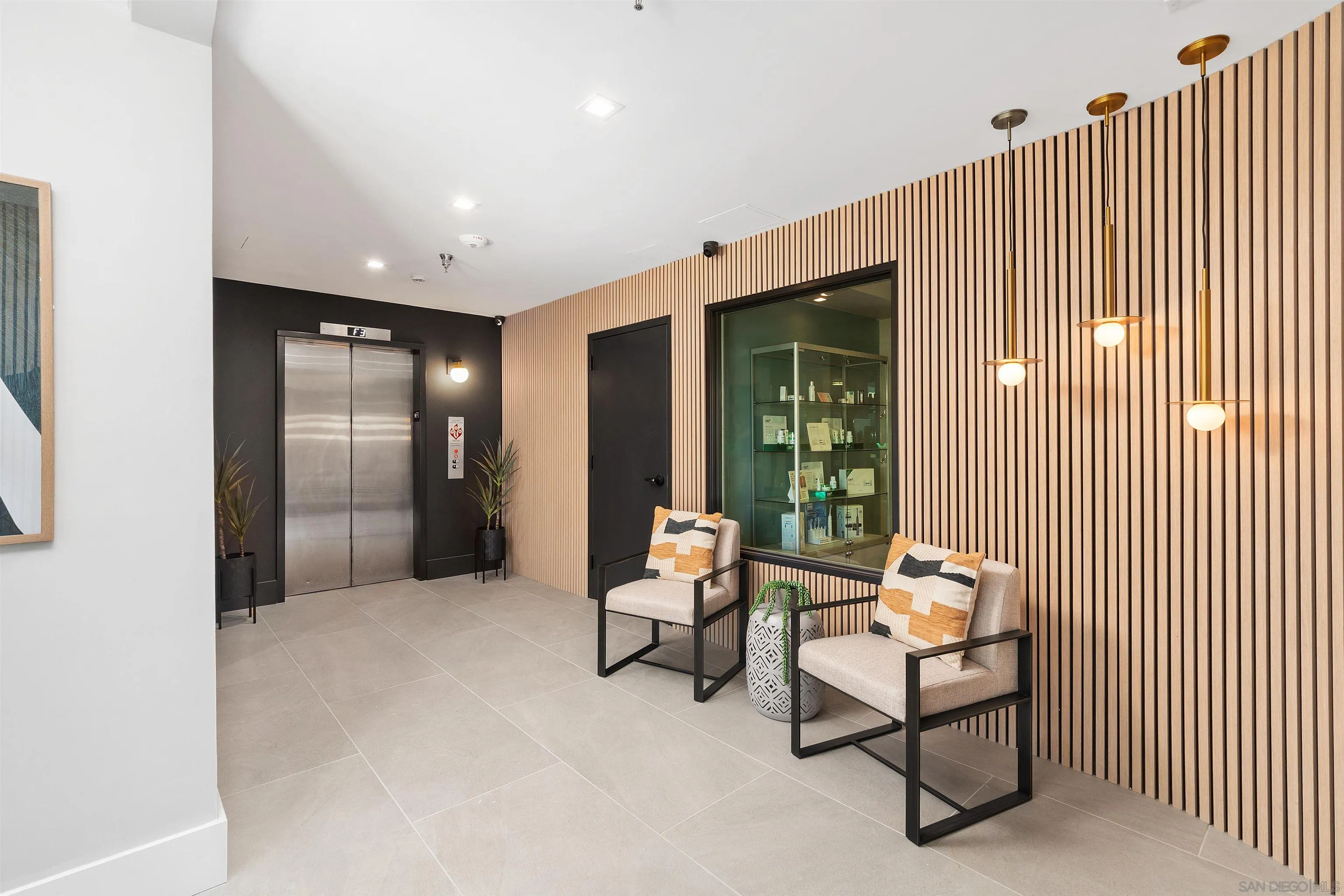 1111 Torrey Pines Road, Unit 203 La Jolla, CA 92037 - Photo 3 of 10 a living room with furniture