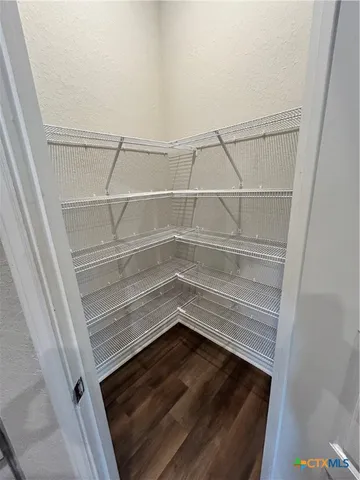 a washer and dryer sitting on a shelf