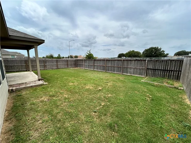 a view of a garden with stairs