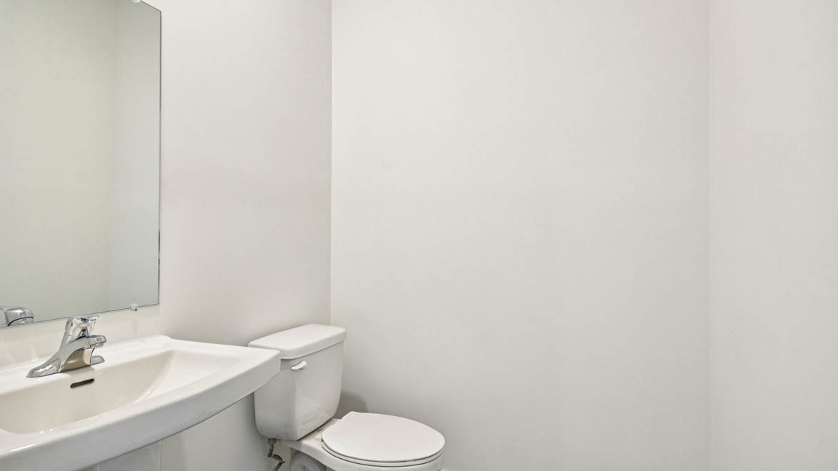 392 Summit Circle Lombard, IL 60148 - Photo 46 of 61 a white toilet sitting next to a white sink