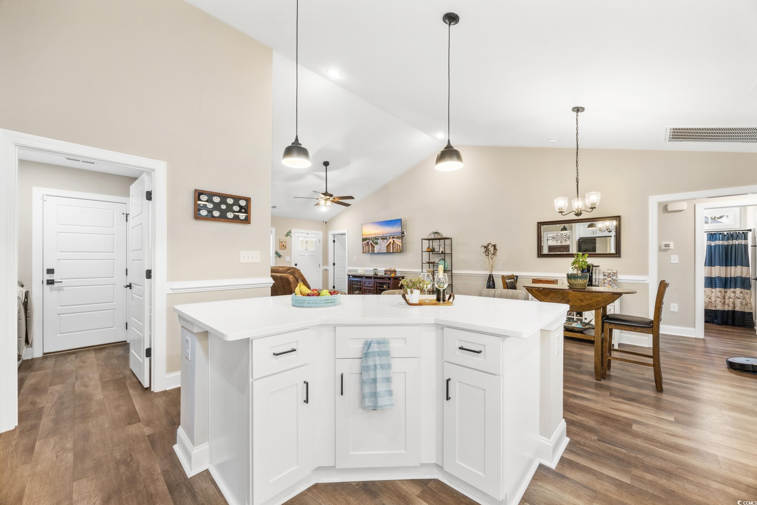 3390 Dusty Road Loris, SC 29569 - Photo 12 of 33 Kitchen featuring a kitchen island, white cabinetr