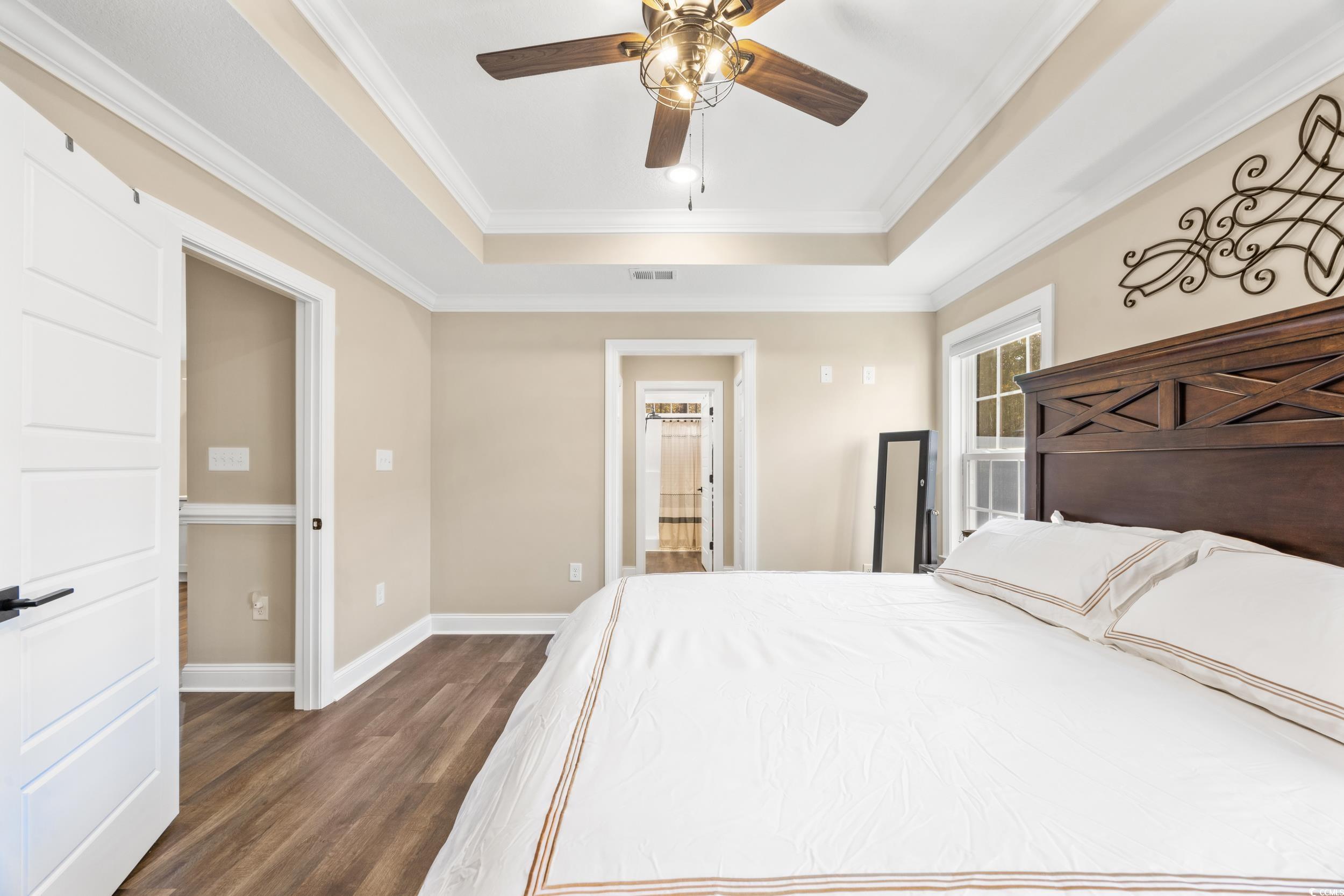 3390 Dusty Road Loris, SC 29569 - Photo 15 of 33 Bedroom with ornamental molding, dark hardwood / w