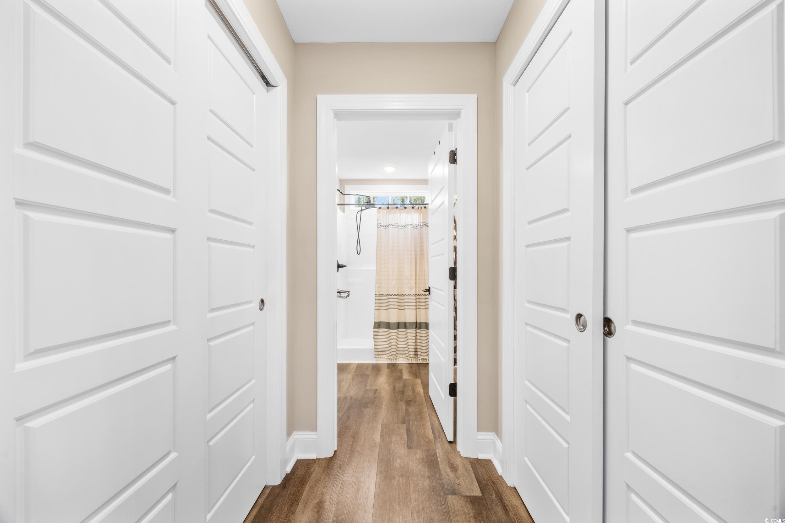 3390 Dusty Road Loris, SC 29569 - Photo 16 of 33 Hallway with wood-type flooring