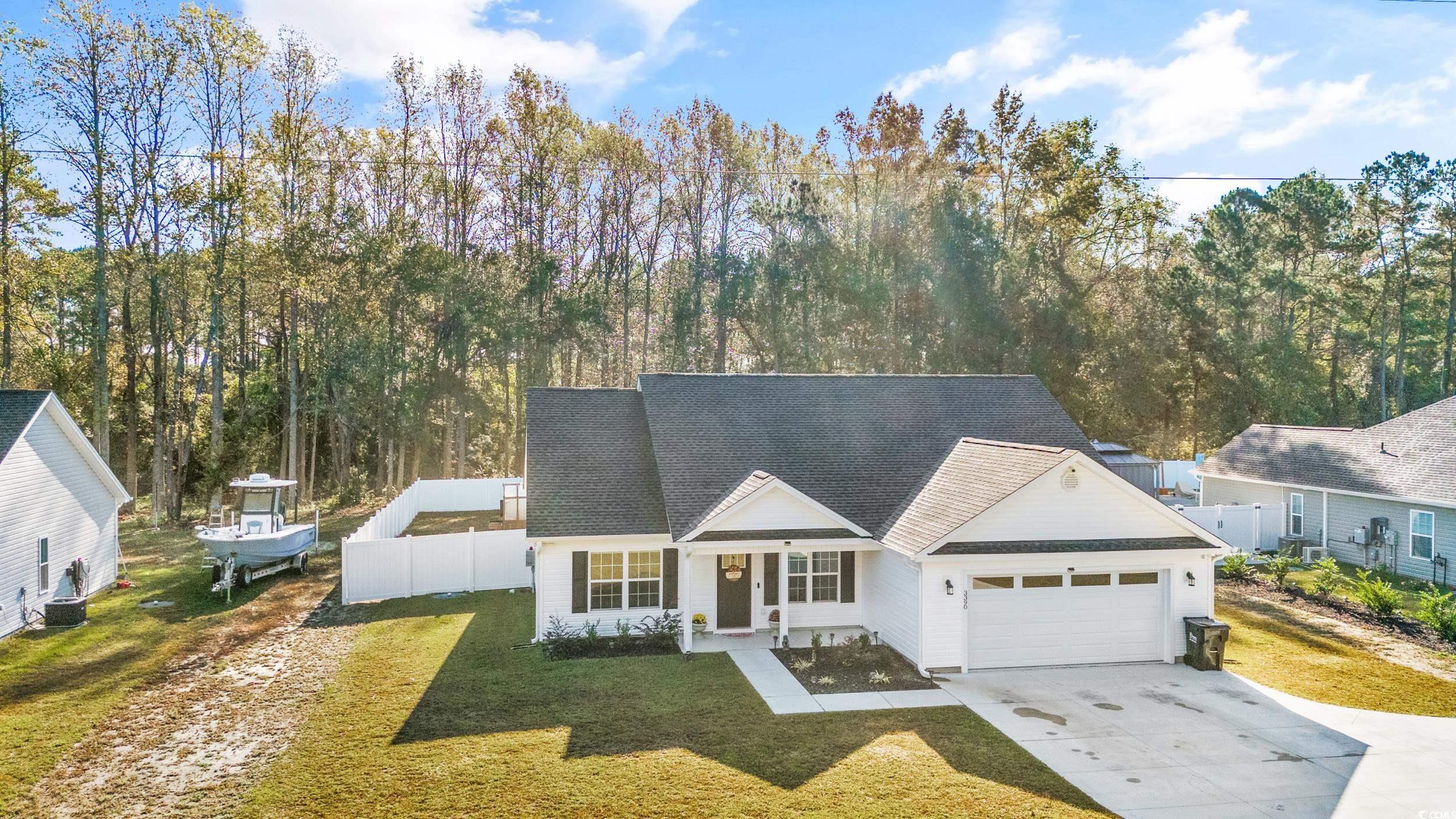 3390 Dusty Road Loris, SC 29569 - Photo 2 of 33 View of front of property featuring a front yard a