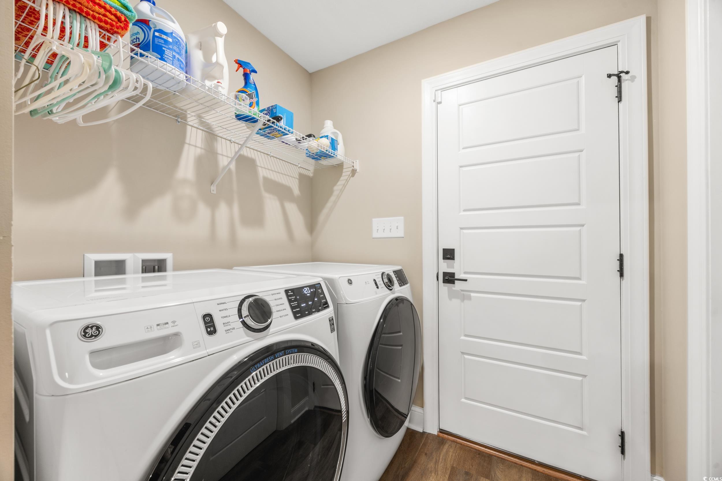 3390 Dusty Road Loris, SC 29569 - Photo 24 of 33 Laundry area featuring dark wood-type flooring and