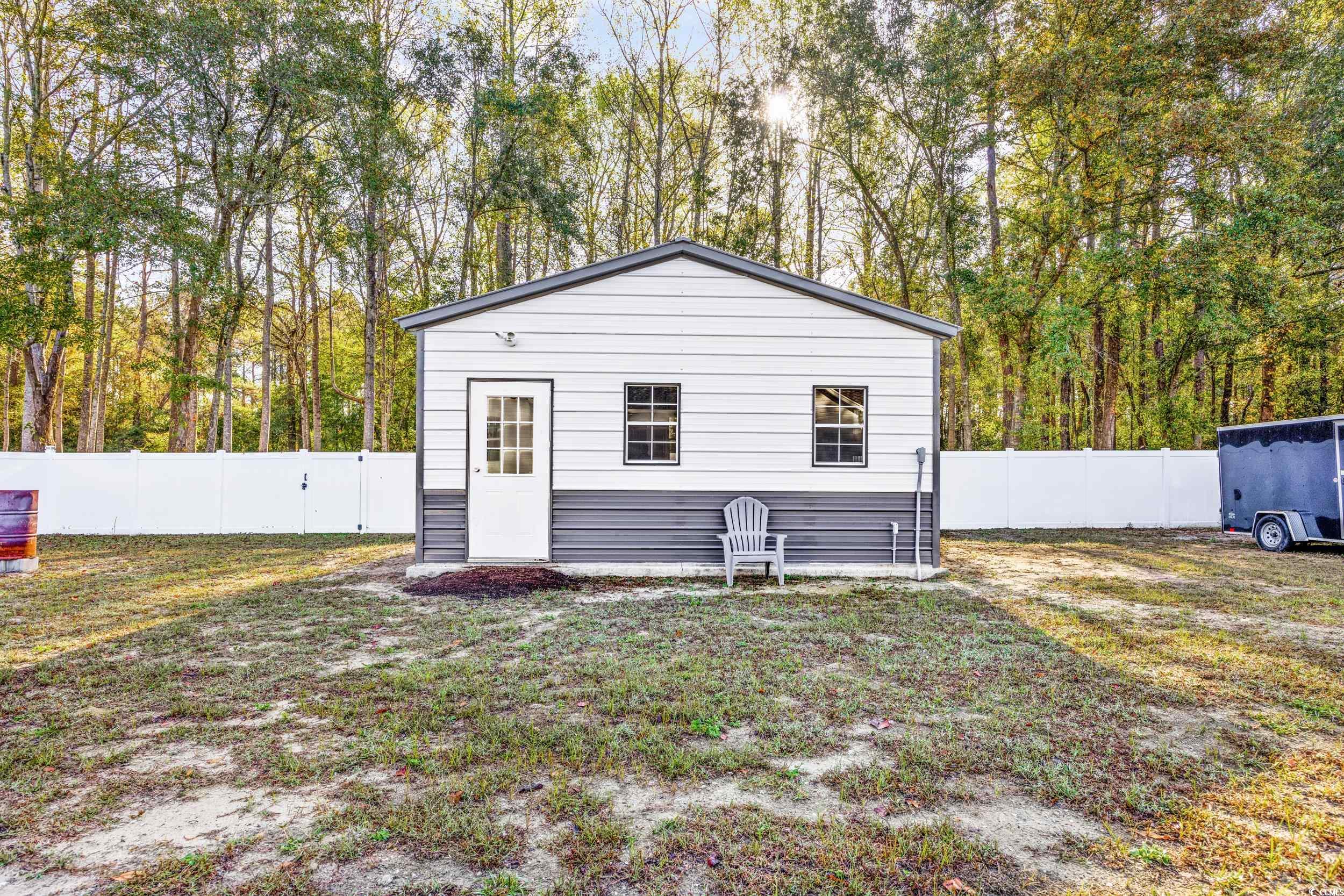 3390 Dusty Road Loris, SC 29569 - Photo 31 of 33 Exterior space featuring a yard