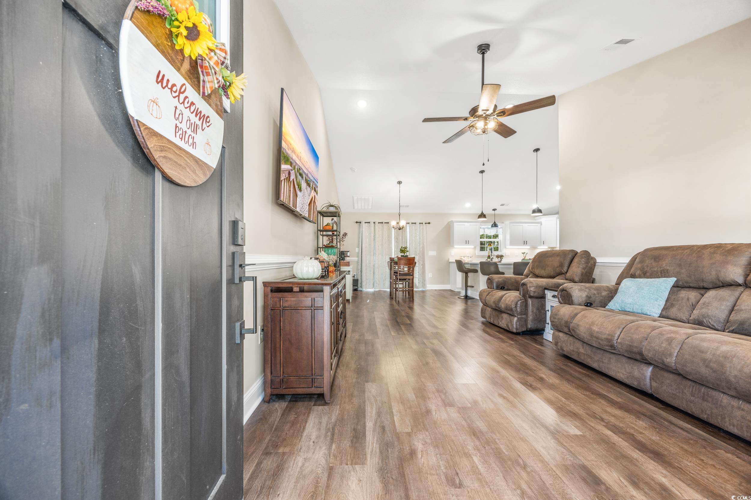 3390 Dusty Road Loris, SC 29569 - Photo 7 of 33 Living room featuring hardwood / wood-style floori