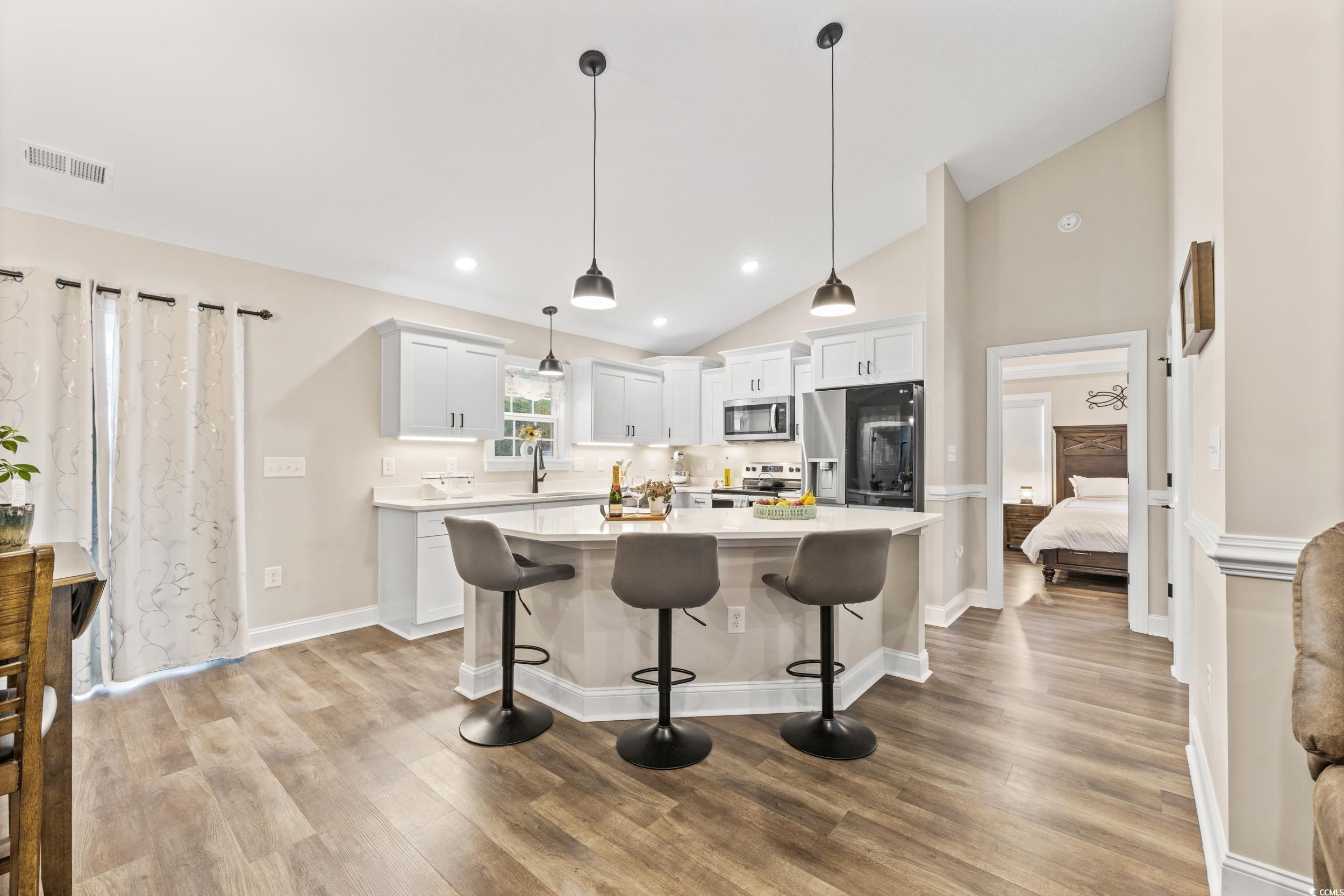 3390 Dusty Road Loris, SC 29569 - Photo 10 of 33 Kitchen featuring white cabinetry, light wood-type