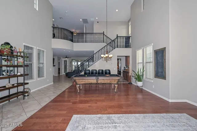 a view of a livingroom with furniture and a flat screen tv