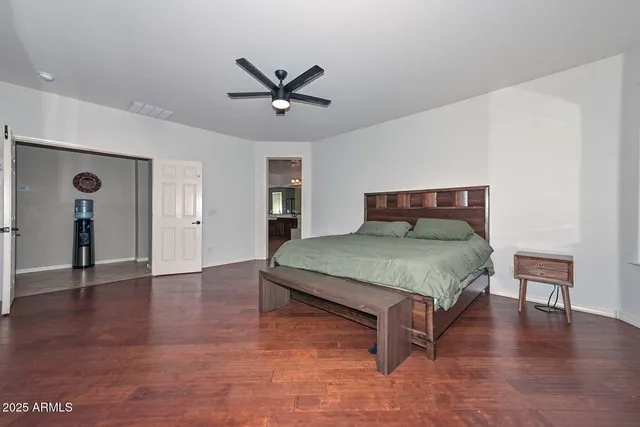 a view of a swimming pool with an outdoor seating