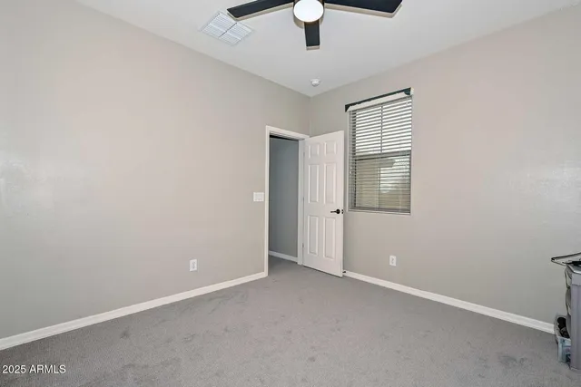 a view of outdoor space with garden and trees