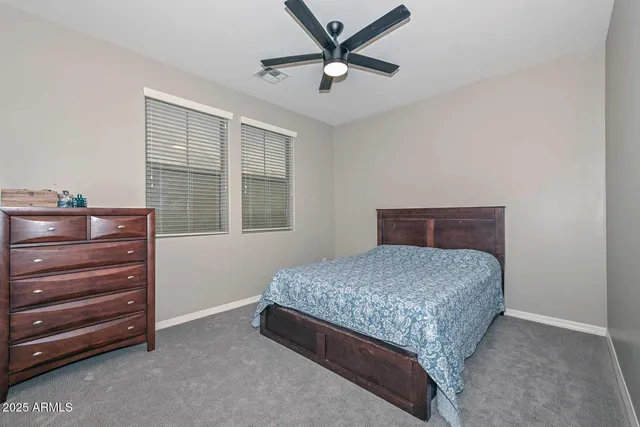 a view of a fountain in front of a house
