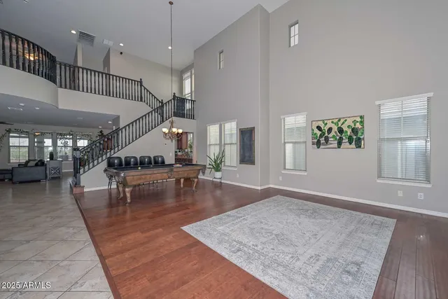 a kitchen with stainless steel appliances granite countertop a stove oven and a refrigerator