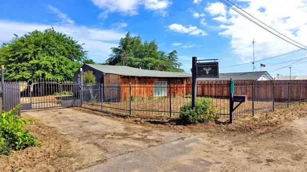 a view of backyard with green space