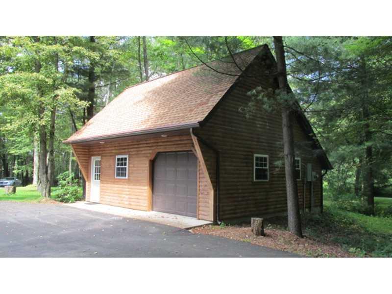 5484 Sandy Lake Polk Road Sandy Lake, PA 16145 - Photo 20 of 25 Parking Lot/Garage. detached garage with workshop and loft