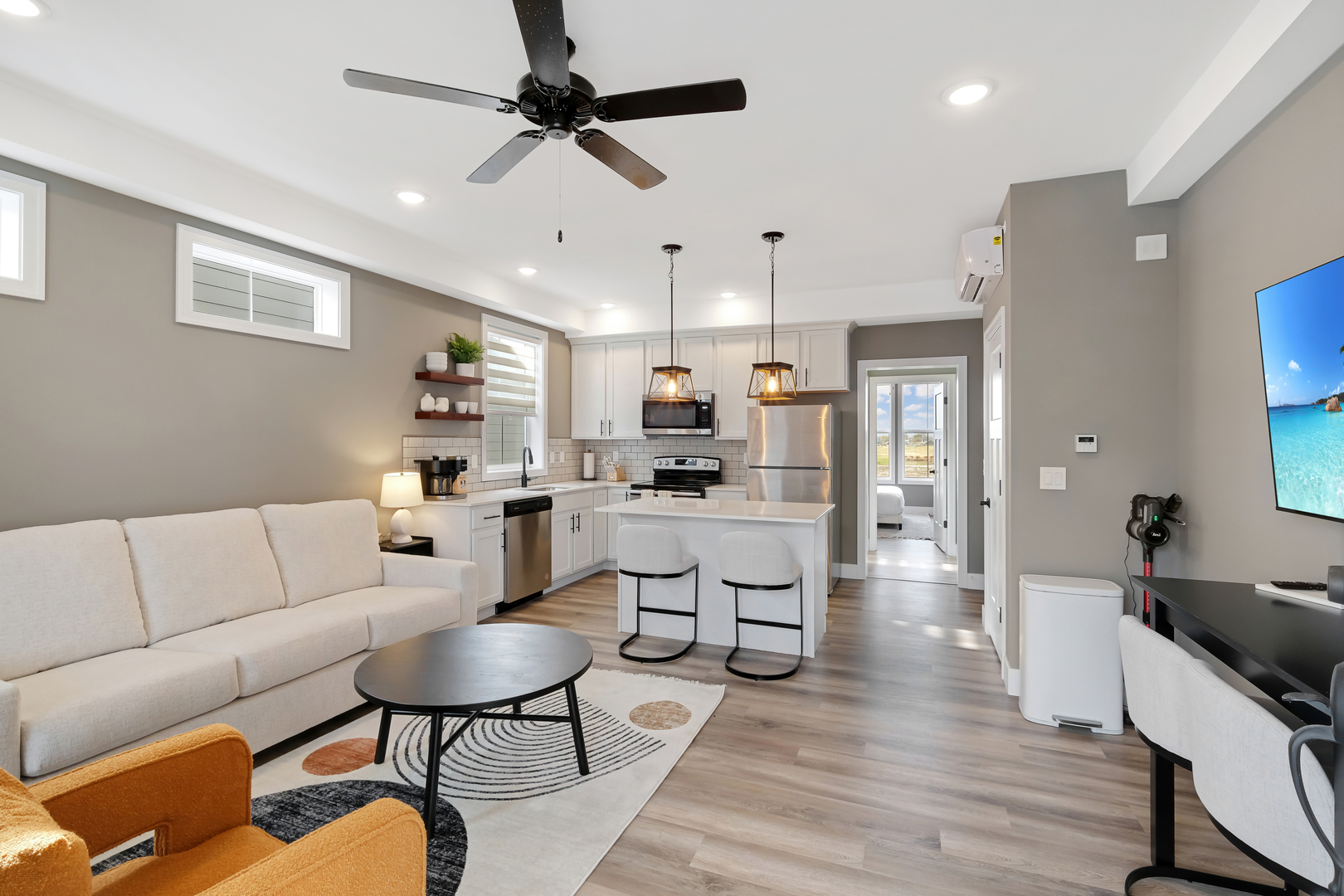 214 Great Lp Drive, Unit 2A Ottawa, IL 61350 - Photo 3 of 10 a living room with furniture kitchen view and a chandelier
