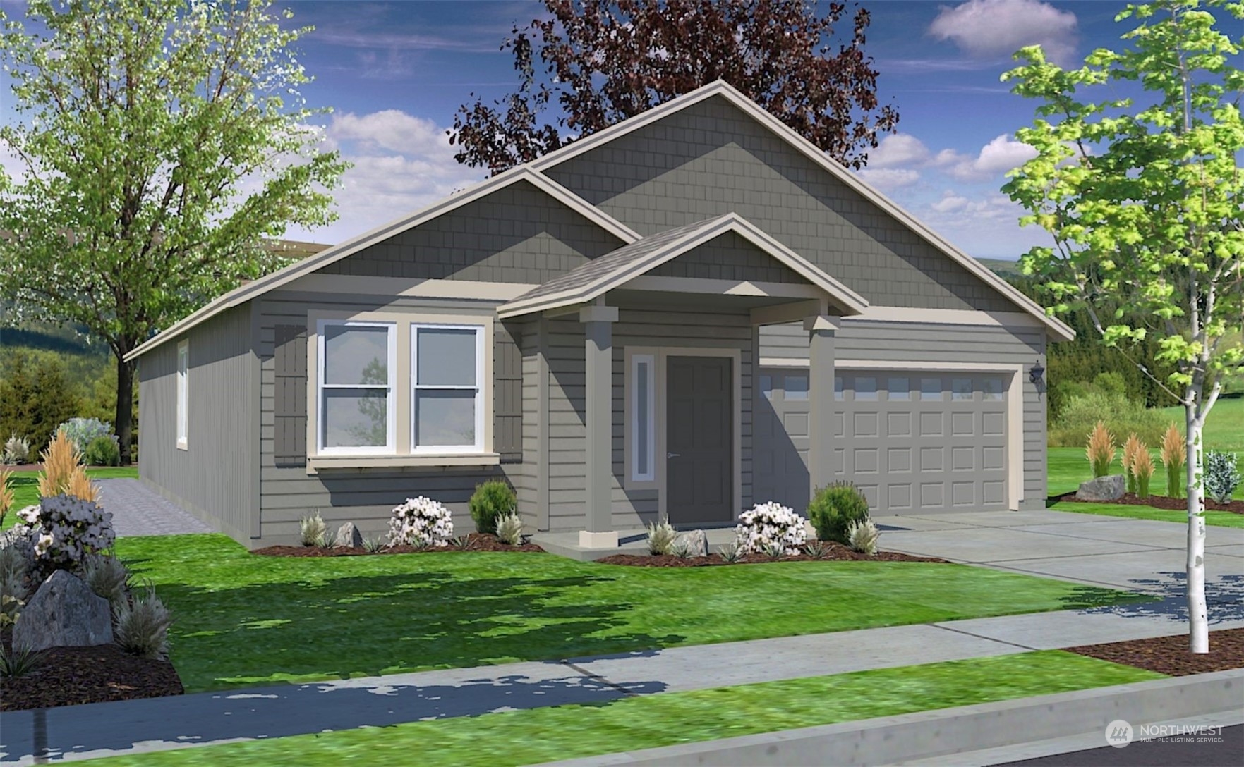 1920 Oak Road Moses Lake, WA 98837 - Photo 1 of 1 a front view of a house with a garden