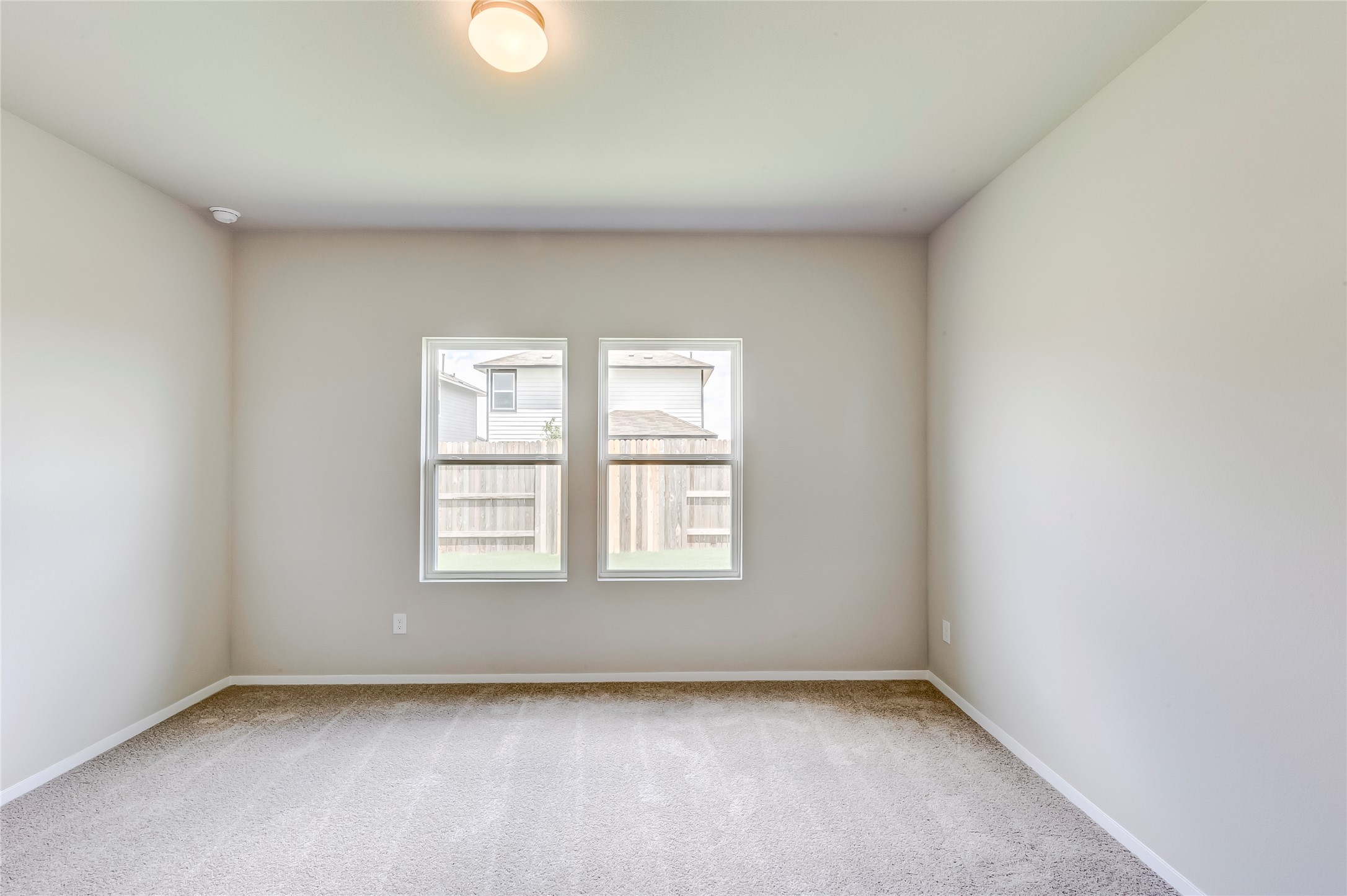 274 Jade Street Maxwell, TX 78656 - Photo 10 of 36 a view of an empty room with a window