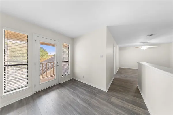 a view of entryway with wooden floor
