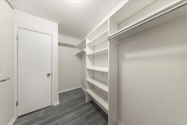 a view of an empty walk in closet