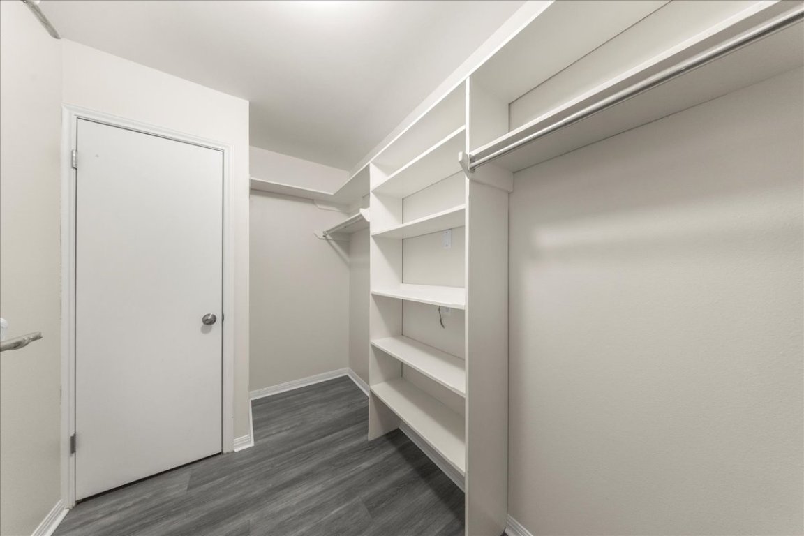 10900 Crown Colony Drive, Unit B Austin, TX 78747 - Photo 23 of 26 a view of an empty walk in closet