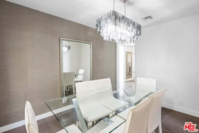 a view of a livingroom with wooden floor