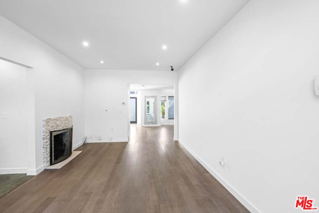 10453 Holman Avenue Los Angeles, CA 90024 - Photo 19 of 67 a view of a livingroom with wooden floor