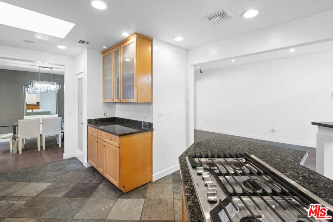 10453 Holman Avenue Los Angeles, CA 90024 - Photo 24 of 67 a kitchen with a stove and a sink
