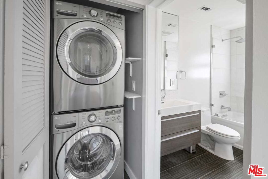 10453 Holman Avenue Los Angeles, CA 90024 - Photo 40 of 67 a bathroom with a sink a toilet and shower