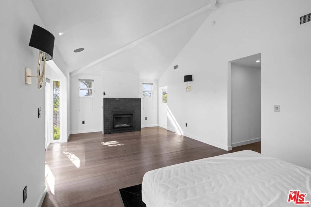 10453 Holman Avenue Los Angeles, CA 90024 - Photo 49 of 67 a living room with furniture and a fireplace