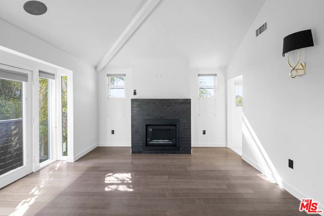 10453 Holman Avenue Los Angeles, CA 90024 - Photo 50 of 67 a view of an empty room with window and fire place