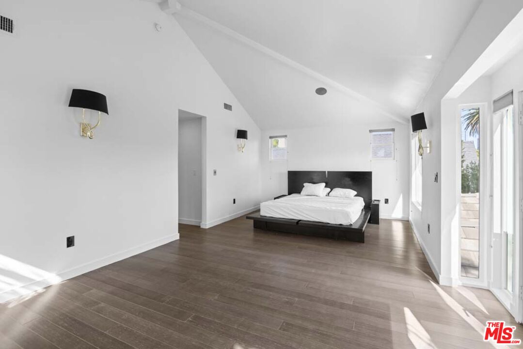 10453 Holman Avenue Los Angeles, CA 90024 - Photo 52 of 67 a bedroom with a bed and a night stand