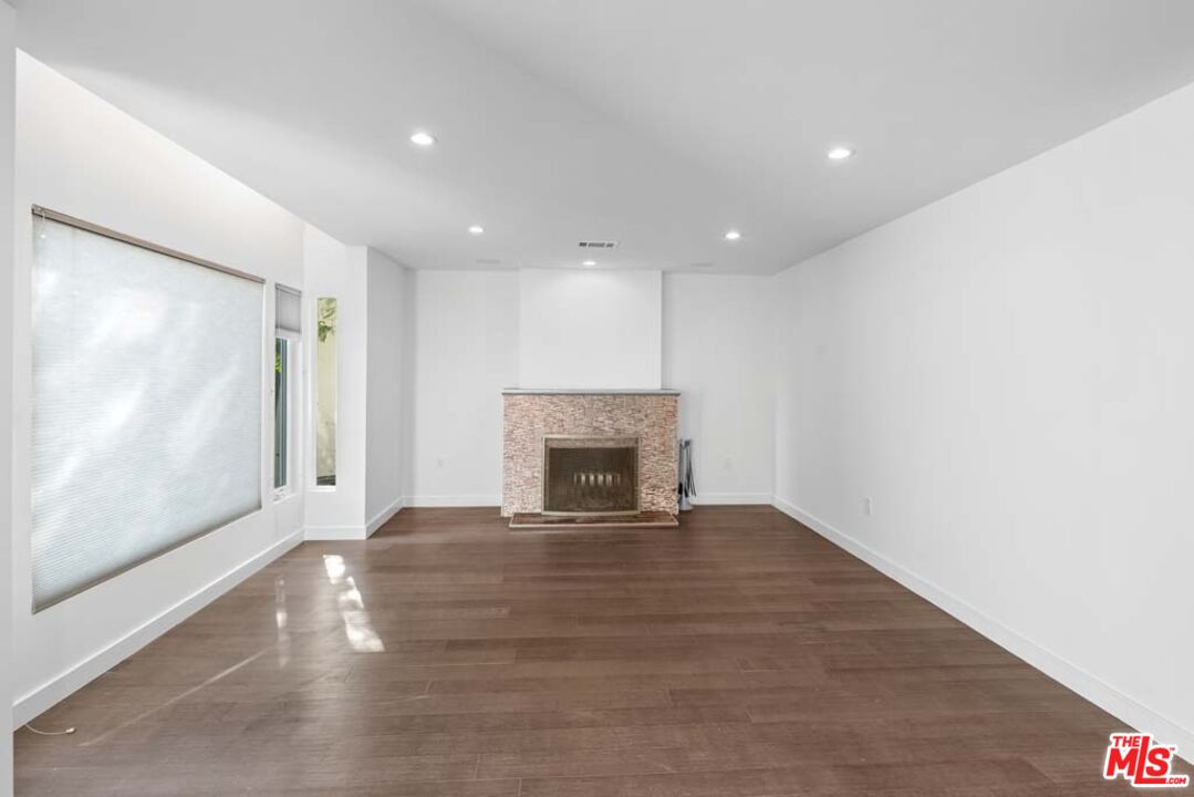 10453 Holman Avenue Los Angeles, CA 90024 - Photo 6 of 67 a view of a livingroom with a fireplace