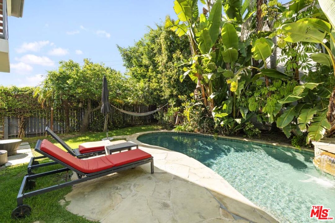 10453 Holman Avenue Los Angeles, CA 90024 - Photo 61 of 67 a small pool with trees in the background
