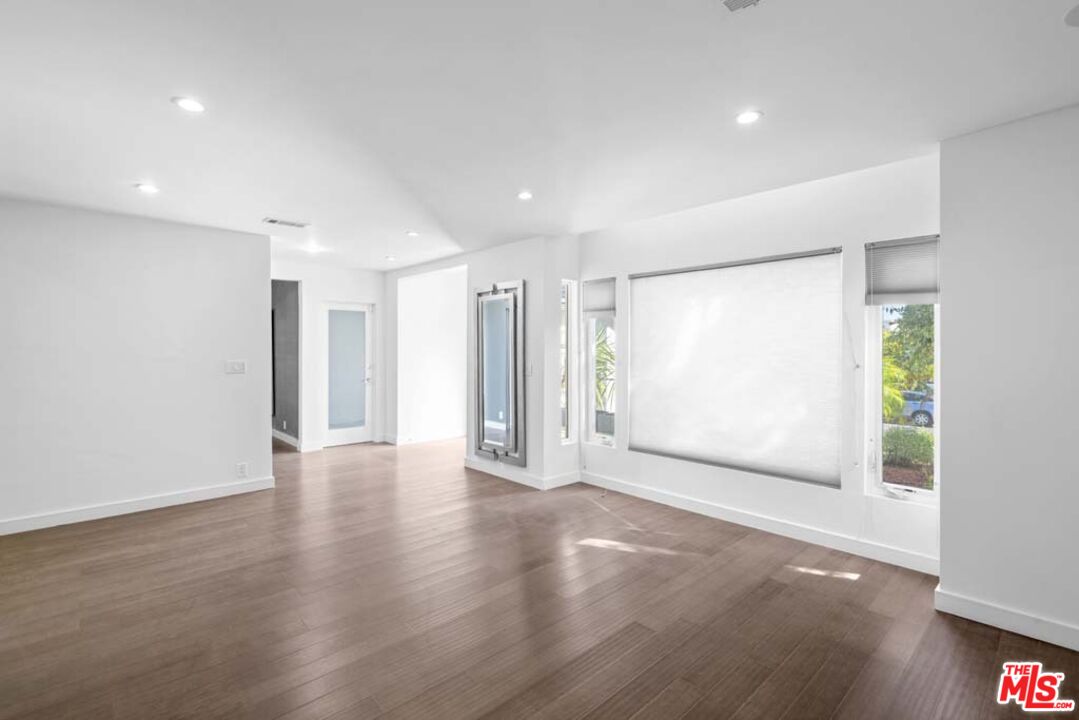 10453 Holman Avenue Los Angeles, CA 90024 - Photo 8 of 67 a view of an empty room with wooden floor