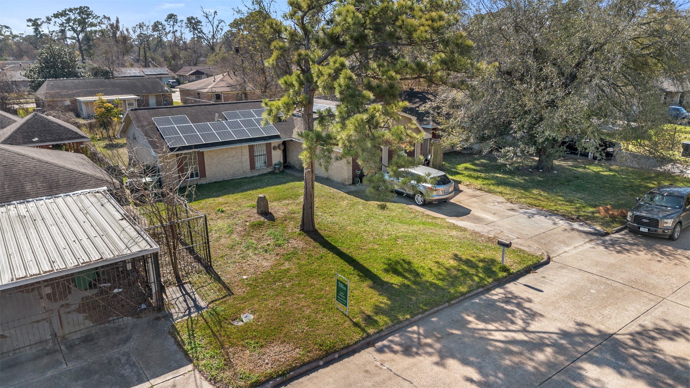 7726 Boggess Road Houston, TX 77016 - Photo 22 of 30 a view of a swimming pool with a patio