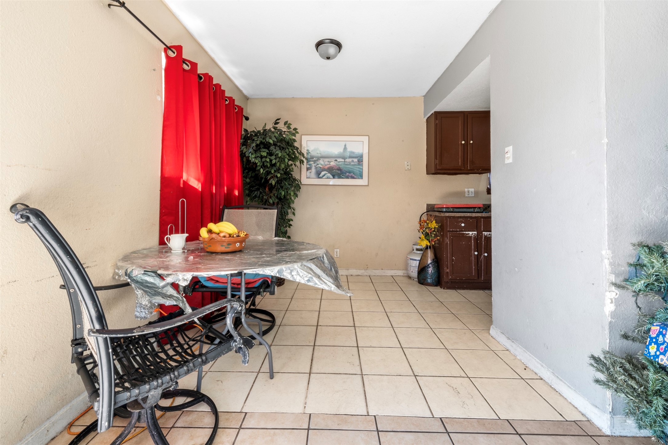 7726 Boggess Road Houston, TX 77016 - Photo 7 of 30 a view of a dining room with furniture and chandelier