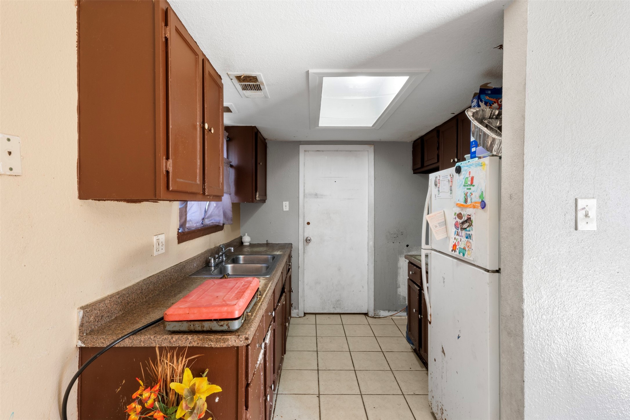 7726 Boggess Road Houston, TX 77016 - Photo 8 of 30 a room with storage and utility