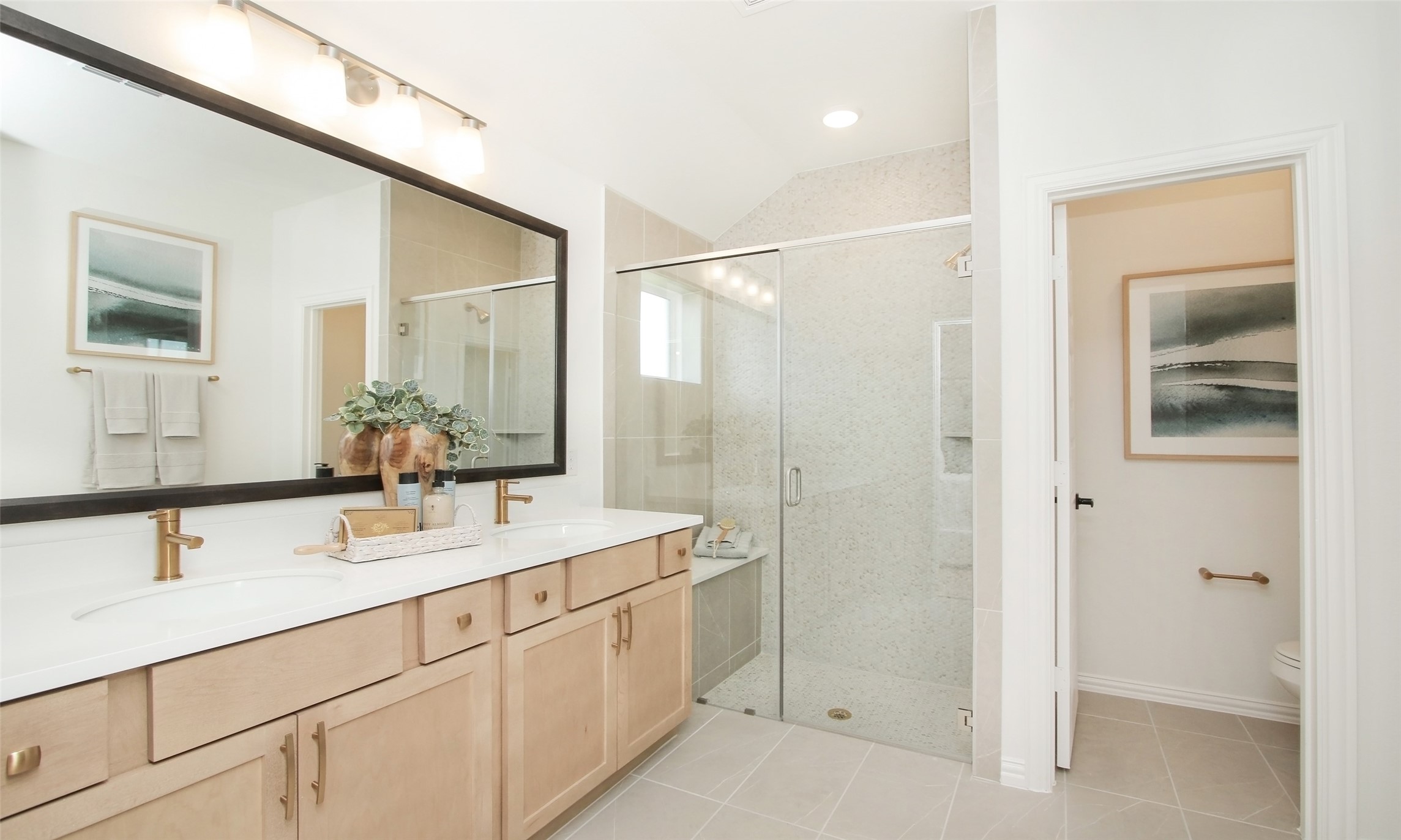 2726 Alexis Street Seabrook, TX 77586 - Photo 13 of 31 a bathroom with a double vanity sink mirror and shower