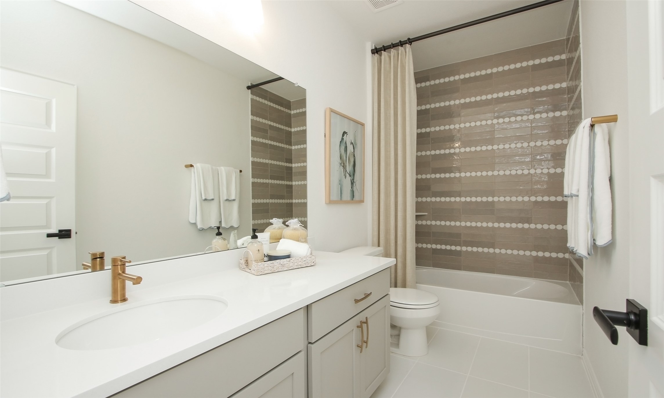 2726 Alexis Street Seabrook, TX 77586 - Photo 16 of 31 a bathroom with a sink toilet and shower