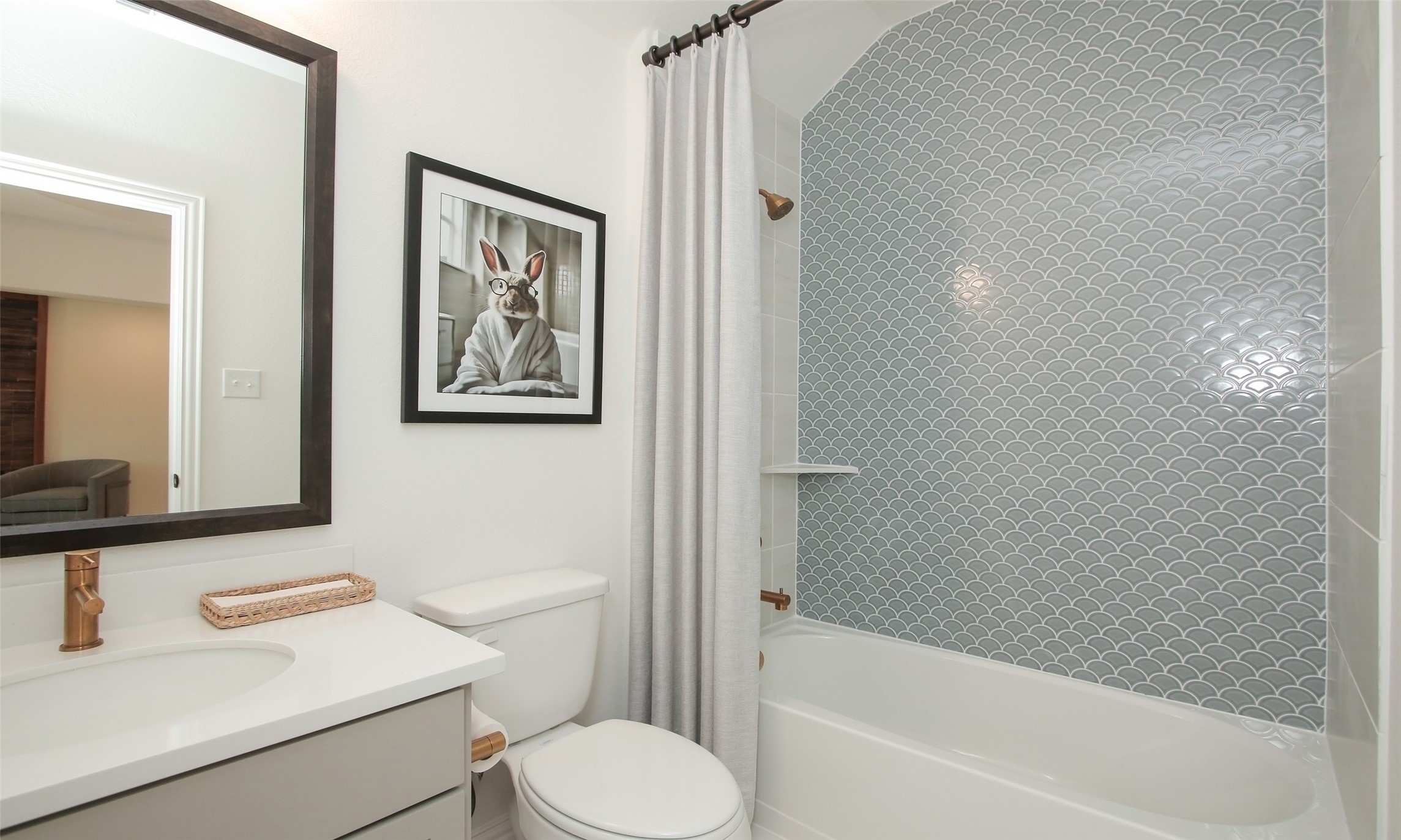 2726 Alexis Street Seabrook, TX 77586 - Photo 18 of 31 a bathroom with a toilet a sink and a bathtub