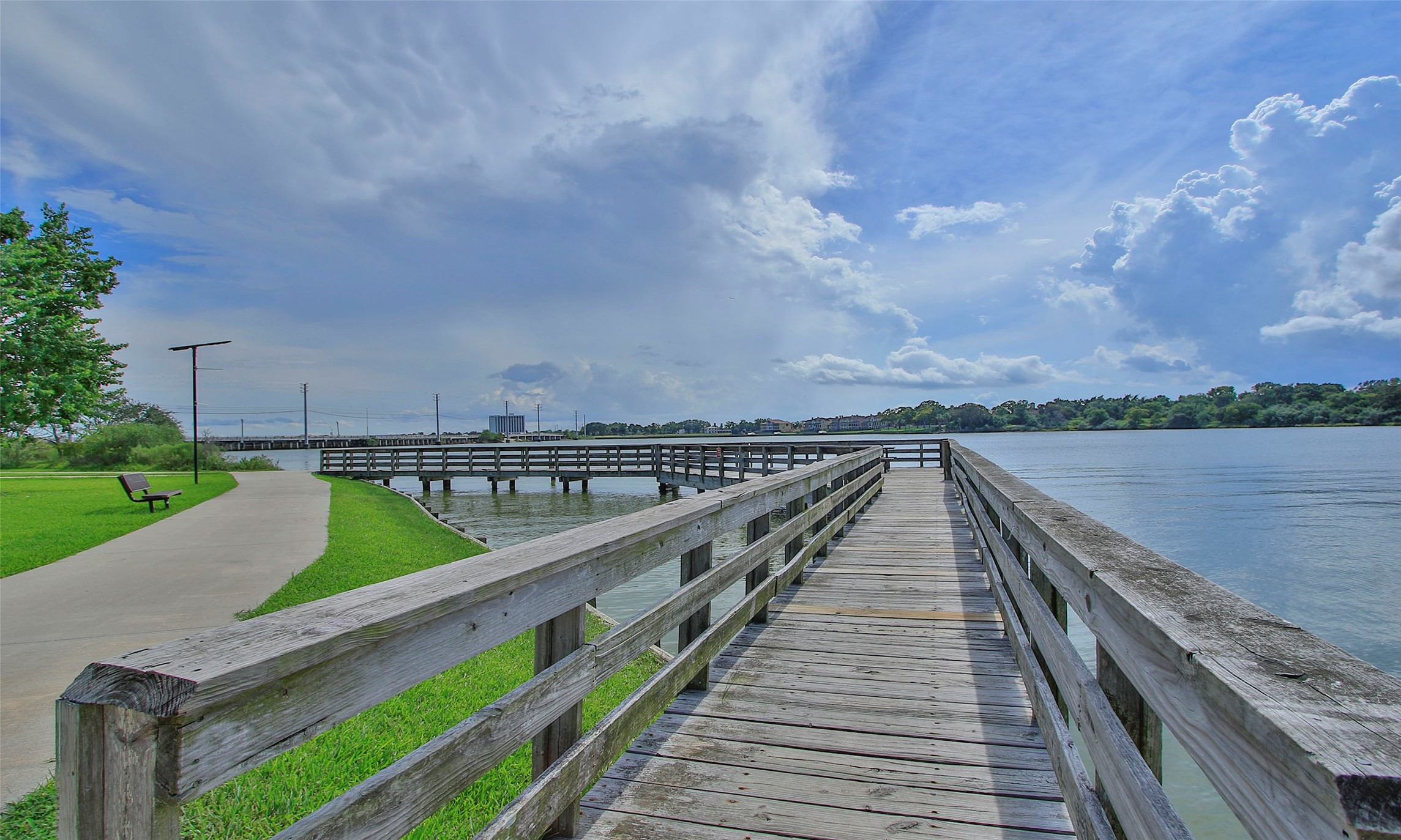 2726 Alexis Street Seabrook, TX 77586 - Photo 29 of 31 a view of a balcony with wooden floor and lake view