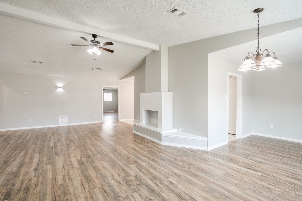 1343 Littleport Lane Channelview, TX 77530 - Photo 17 of 33 a view of a room with wooden floor and ceiling fan