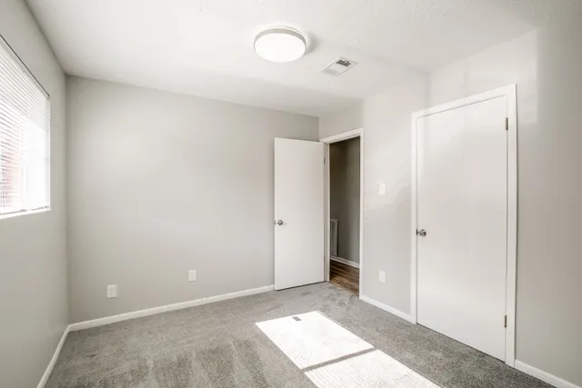 an empty room with windows