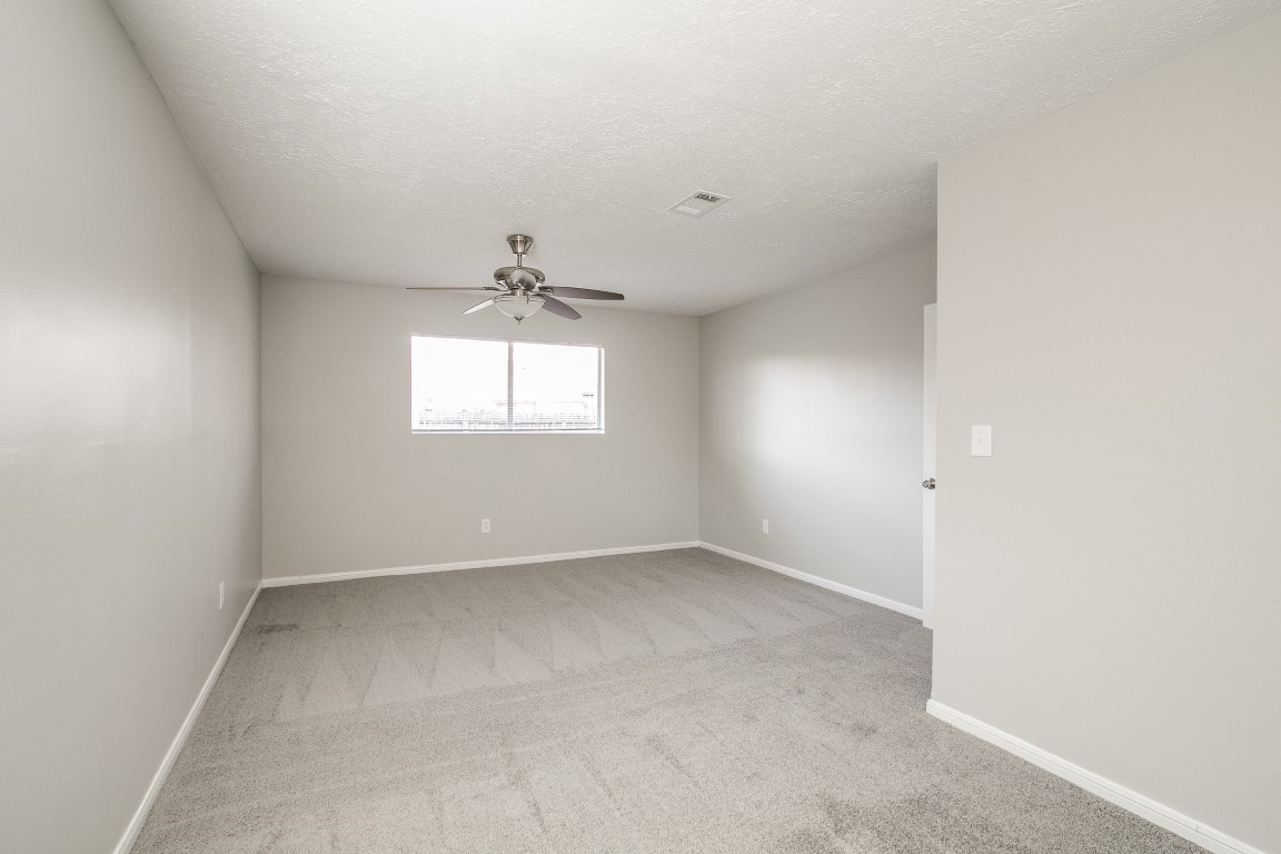 1343 Littleport Lane Channelview, TX 77530 - Photo 31 of 33 an empty room with a window