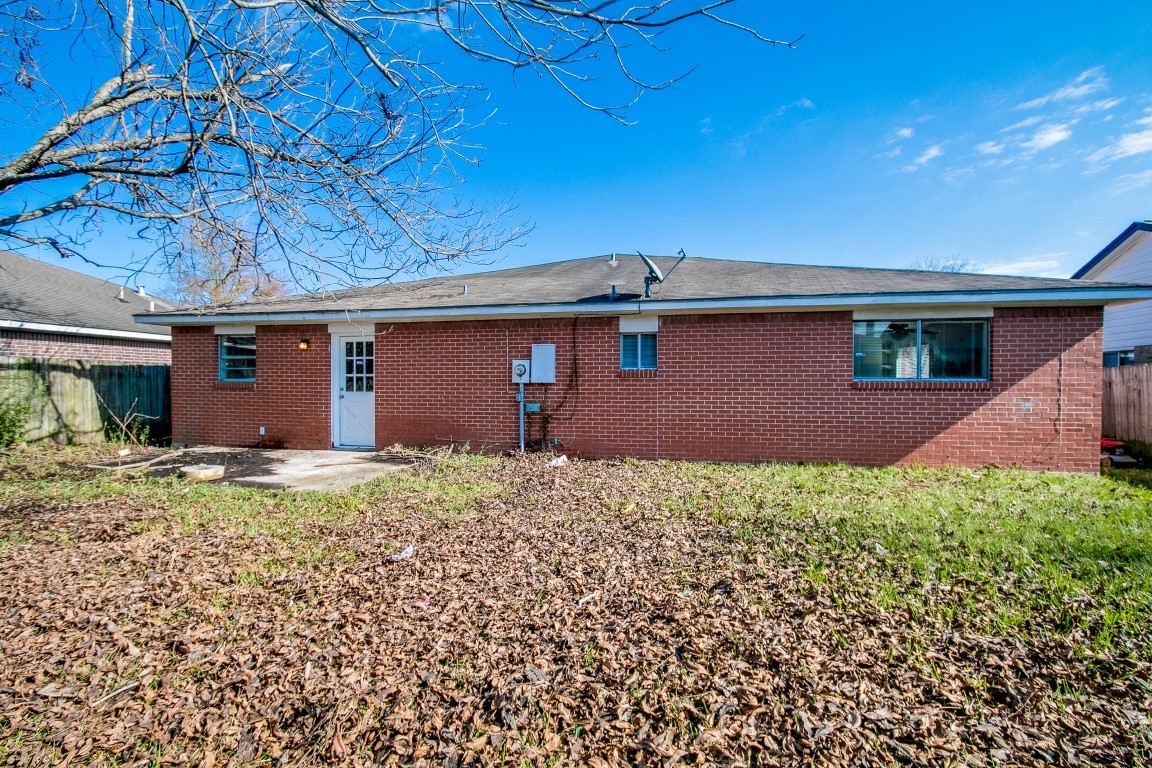 1343 Littleport Lane Channelview, TX 77530 - Photo 32 of 33 a house with a outdoor space
